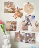 Minimalistische Wandcollage Kaarten
