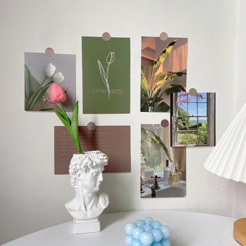 Minimalistische Wandcollage Kaarten